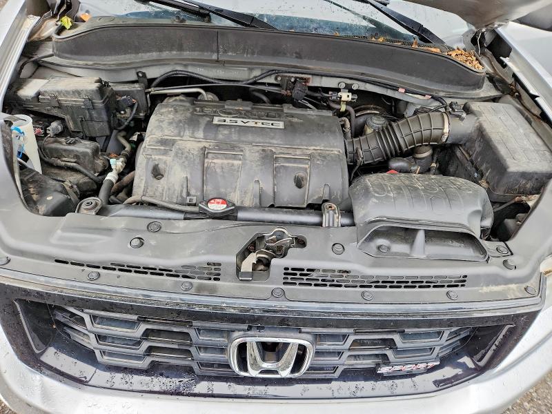Photo 11 from auction – 2014 HONDA RIDGELINE with VIN 5FPYK1F75EB004097