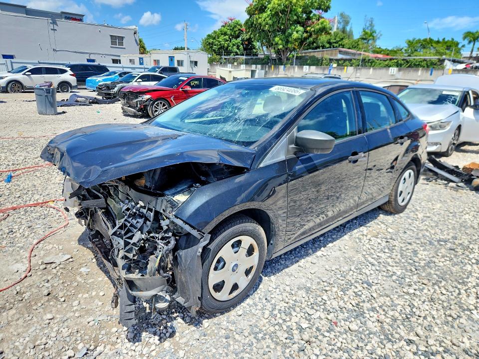 FORD FOCUS 2015 with VIN 1FADP3E25FL310800 - Photo from auction