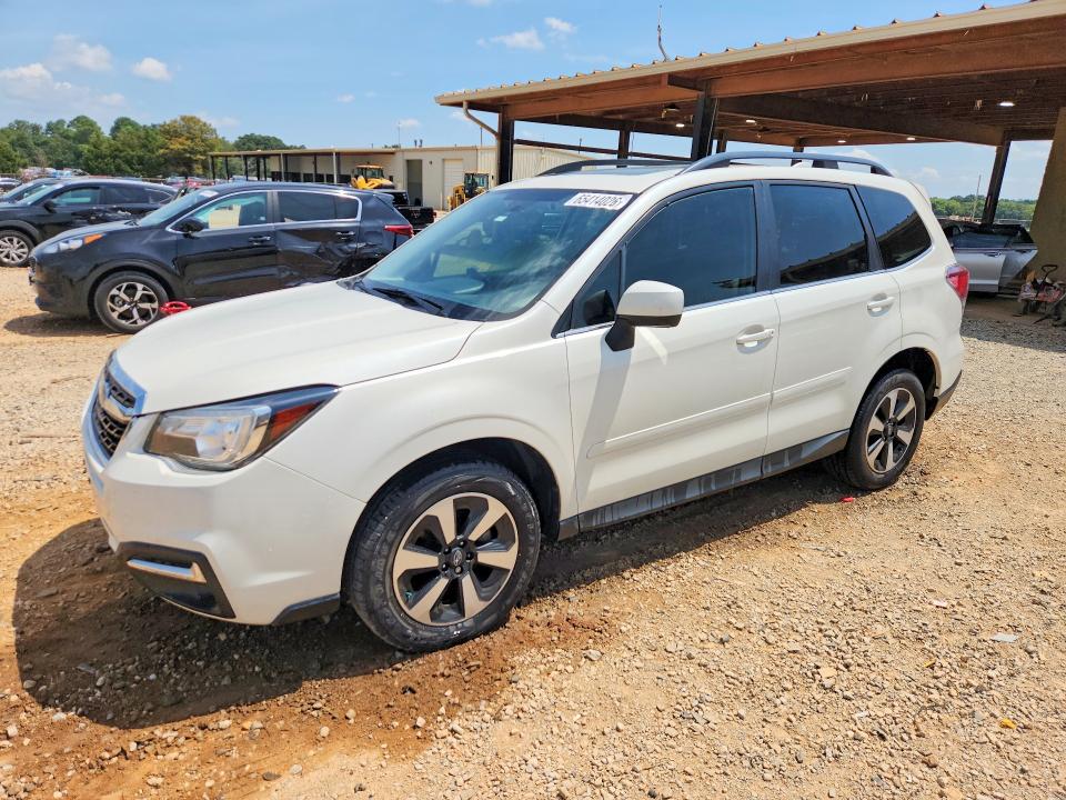 SUBARU FORESTER 2018 with VIN JF2SJARCXJH543868 - Photo from auction