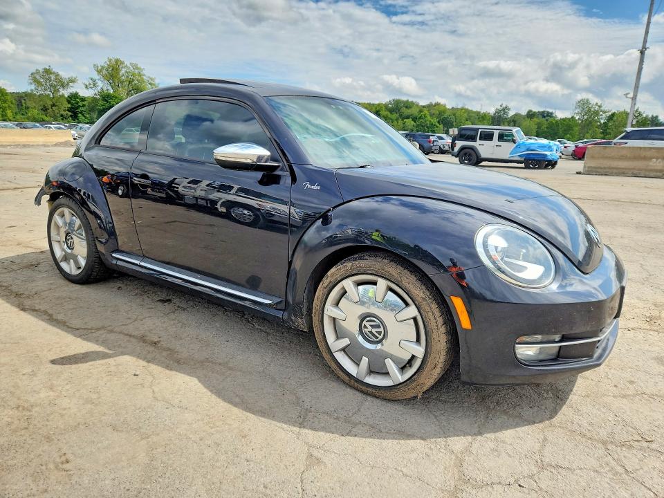 Photo 4 from auction – 2013 VOLKSWAGEN BEETLE with VIN 3VWVA7AT2DM638626