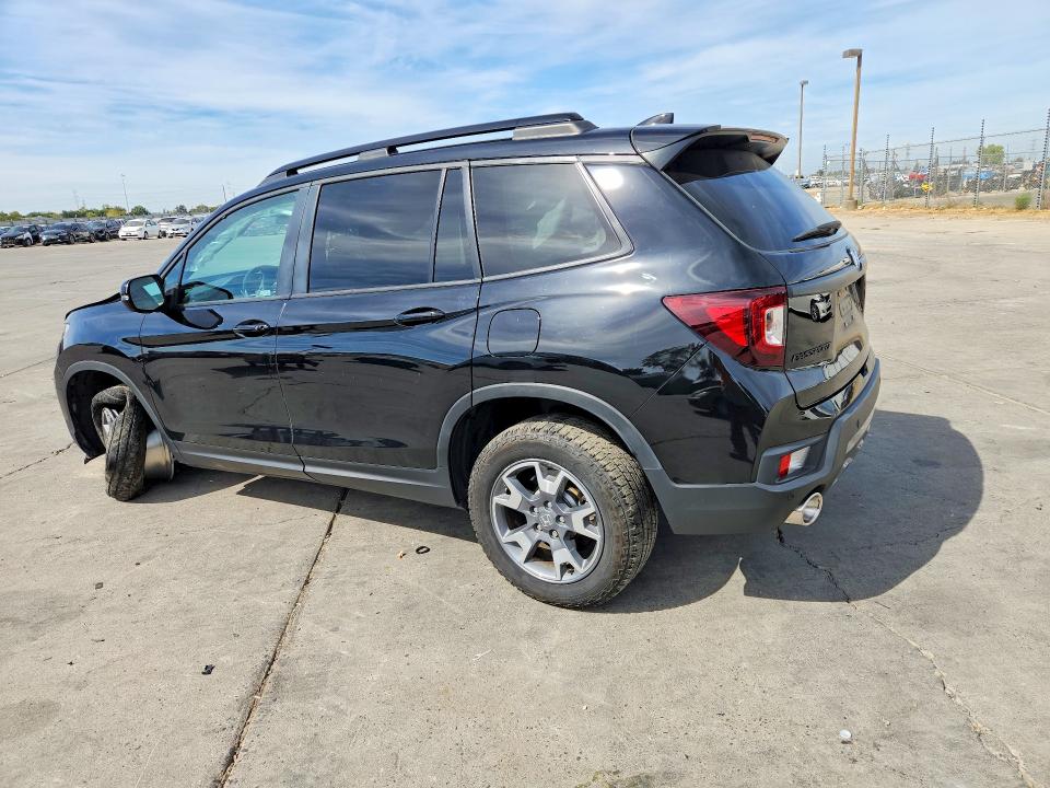 Photo 2 from auction – 2023 HONDA PASSPORT with VIN 5FNYF8H65PB016263