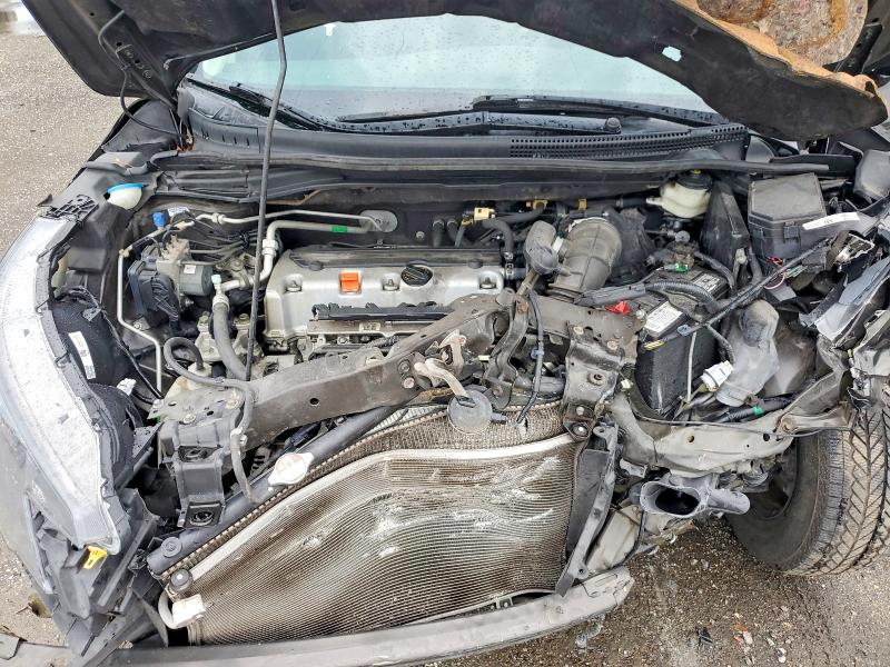 Photo 12 from auction – 2014 HONDA CR-V with VIN 2HKRM3H31EH529687