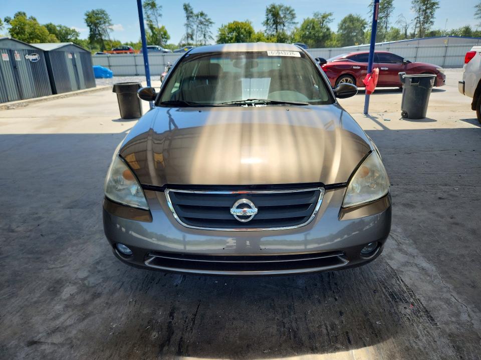 Photo 5 from auction – 2004 NISSAN ALTIMA with VIN 1N4AL11D94C141288