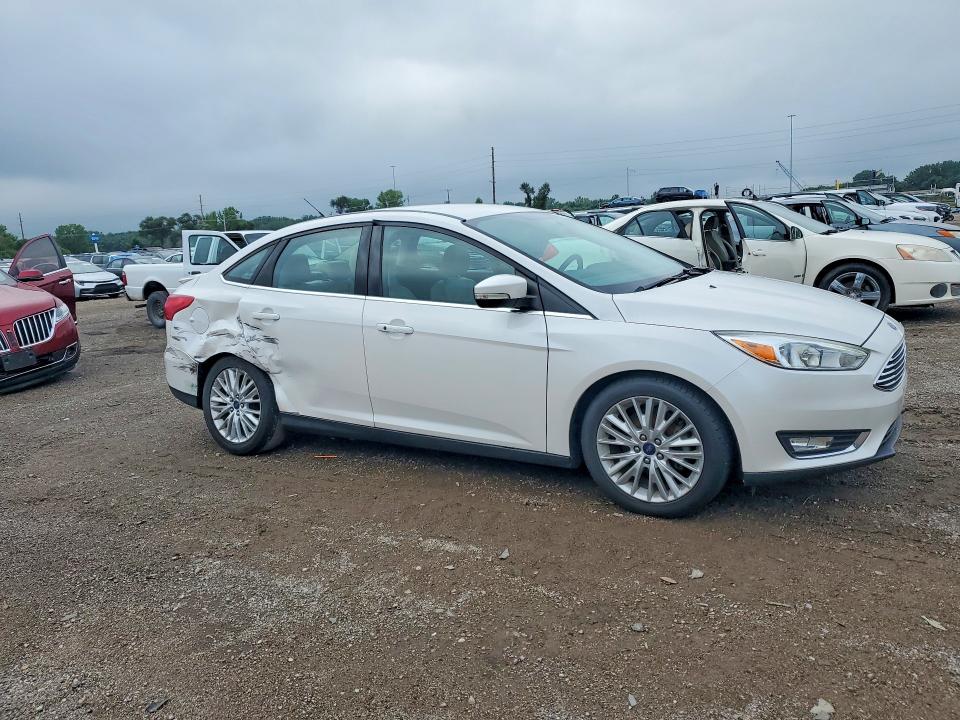 Photo 4 from auction – 2015 FORD FOCUS with VIN 1FADP3J28FL299913