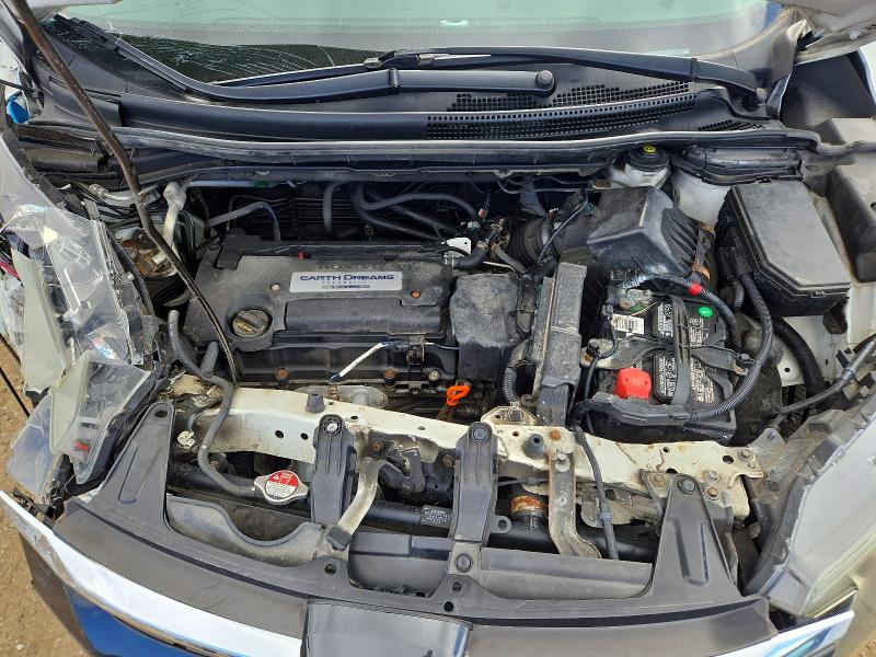 Photo 11 from auction – 2015 HONDA CR-V with VIN 2HKRM3H35FH003127