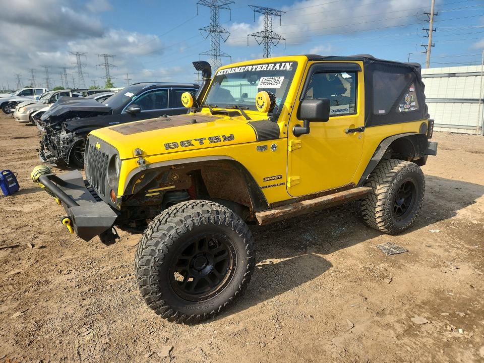 JEEP WRANGLER 2011 with VIN 1J4AA2D12BL537741 - Photo from auction