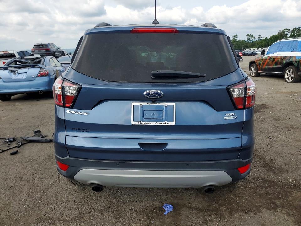 Photo 6 from auction – 2018 FORD ESCAPE with VIN 1FMCU9HD4JUA98601