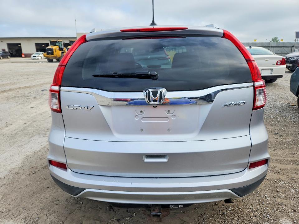 Photo 6 from auction – 2016 HONDA CR-V with VIN 2HKRM4H70GH703325