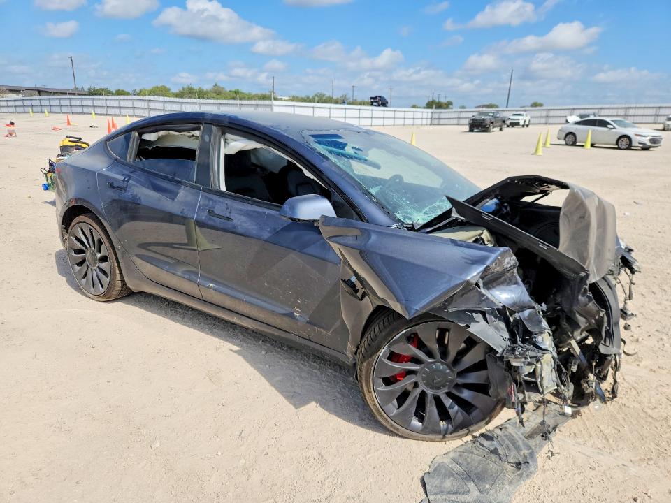 Photo 4 from auction – 2022 TESLA MODEL 3 with VIN 5YJ3E1EC8NF119947