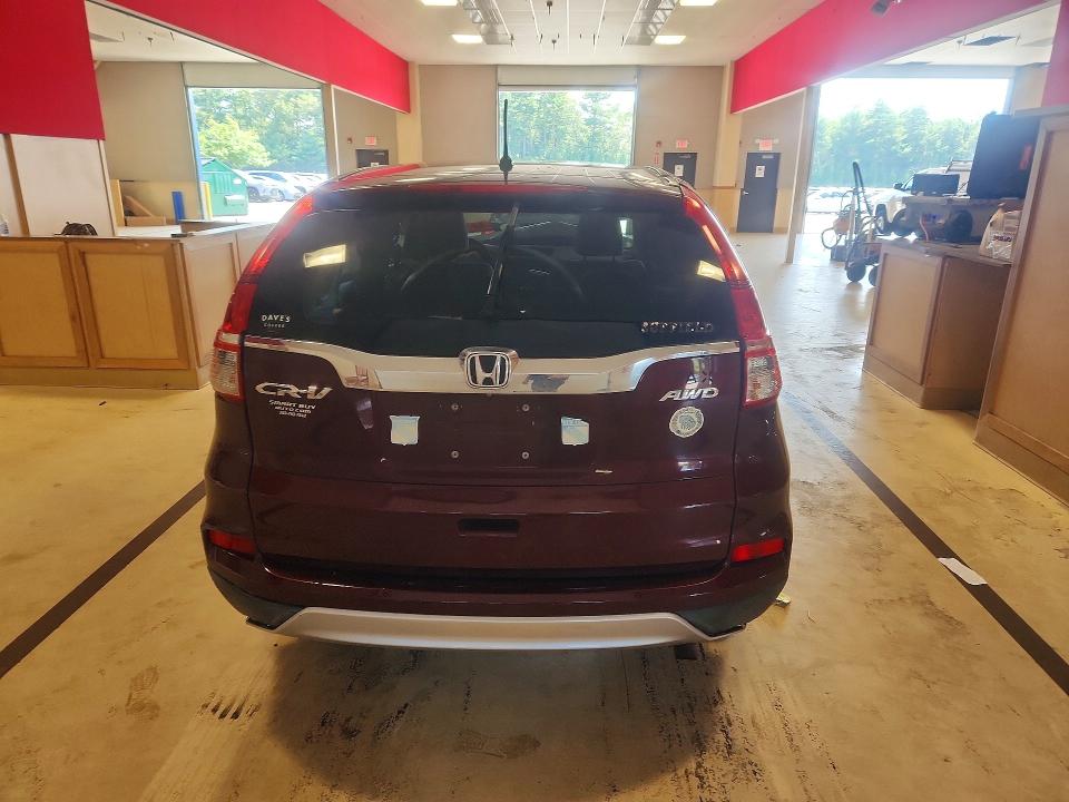 Photo 6 from auction – 2016 HONDA CR-V with VIN 2HKRM4H58GH672713