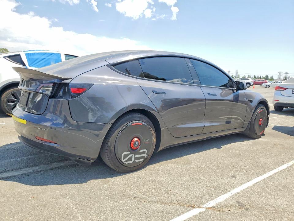 Photo 3 from auction – 2023 TESLA MODEL 3 with VIN 5YJ3E1EA4PF447769