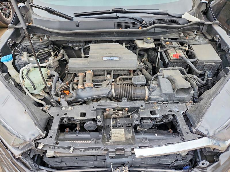 Photo 11 from auction – 2018 HONDA CR-V with VIN 7FARW2H84JE000120
