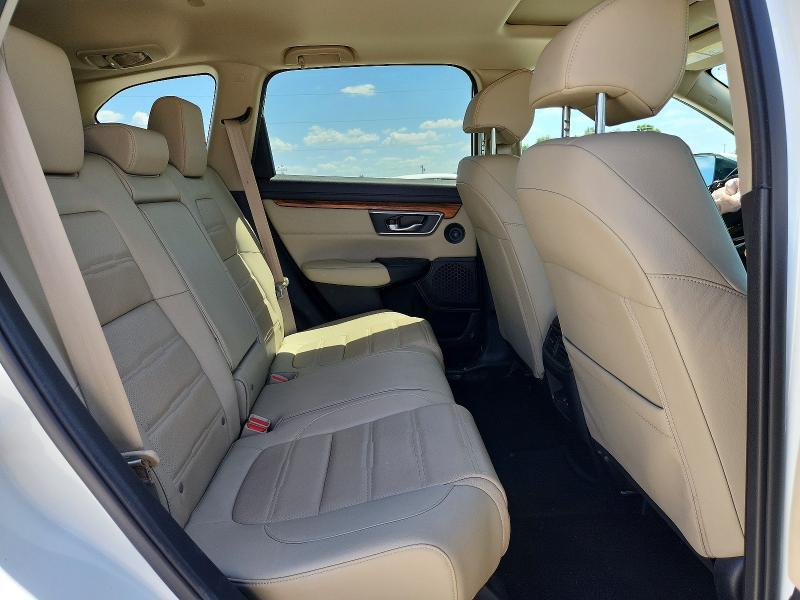 Photo 11 from auction – 2018 HONDA CR-V with VIN 2HKRW2H84JH624593