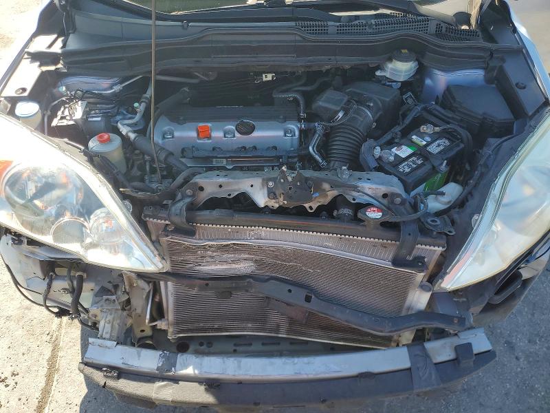 Photo 12 from auction – 2011 HONDA CR-V with VIN 5J6RE3H42BL057247