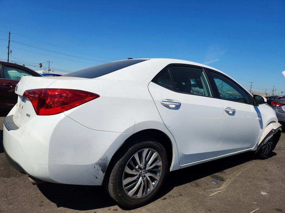 Photo 3 from auction – 2018 TOYOTA COROLLA with VIN 5YFBURHE1JP797206