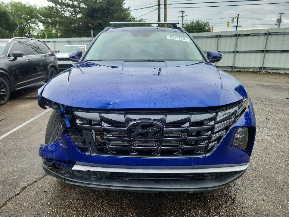 Photo 5 from auction – 2022 HYUNDAI TUCSON with VIN 5NMJFCAE0NH115848