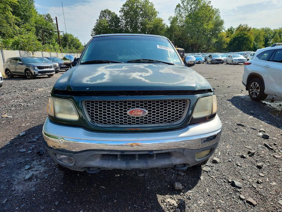 Photo 5 from auction – 2001 FORD F150 with VIN 1FTRW08L41KC63327