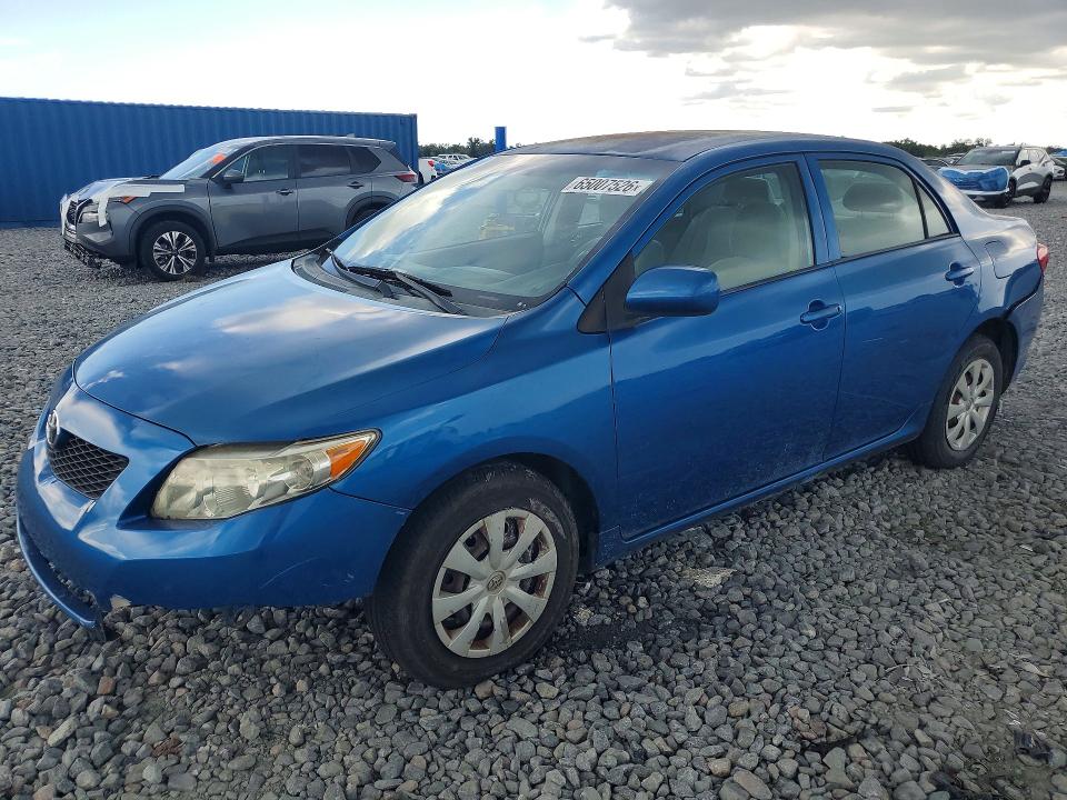 TOYOTA COROLLA 2010 with VIN 2T1BU4EE8AC337631 - Photo from auction