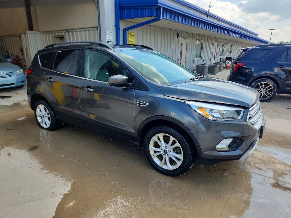 Photo 4 from auction – 2018 FORD ESCAPE with VIN 1FMCU9GD7JUC28744
