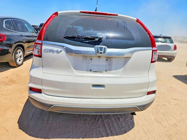 Photo 6 from auction – 2015 HONDA CR-V with VIN 5J6RM3H33FL005190