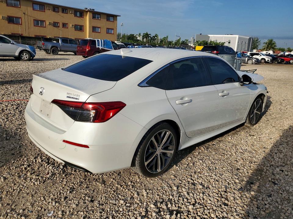 Photo 3 from auction – 2022 HONDA CIVIC with VIN 2HGFE1F95NH326825