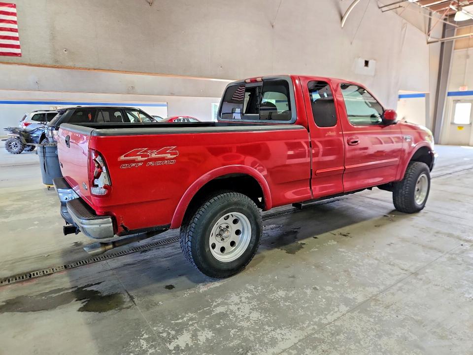 Photo 3 from auction – 2000 FORD F150 with VIN 1FTRX18LXYNB64037