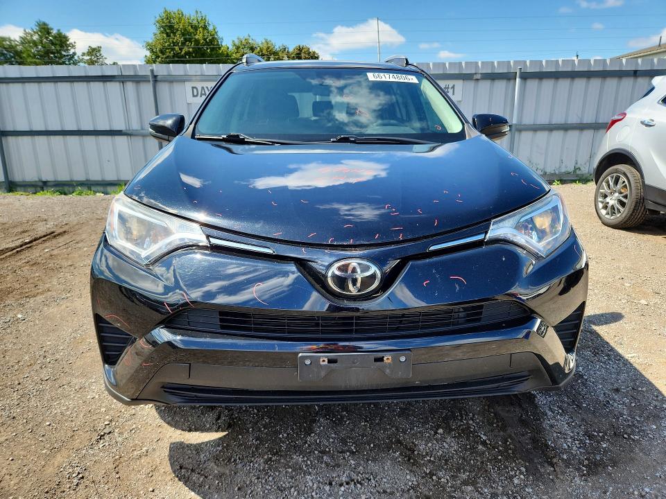 Photo 5 from auction – 2018 TOYOTA RAV4 with VIN 2T3ZFREV6JW507903