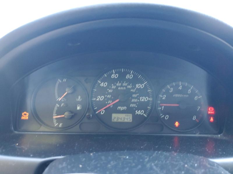 Photo 9 from auction – 2003 MAZDA PROTEGE with VIN JM1BJ225930178553