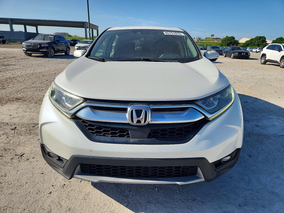 Photo 5 from auction – 2017 HONDA CR-V with VIN 5J6RW1H86HL012079