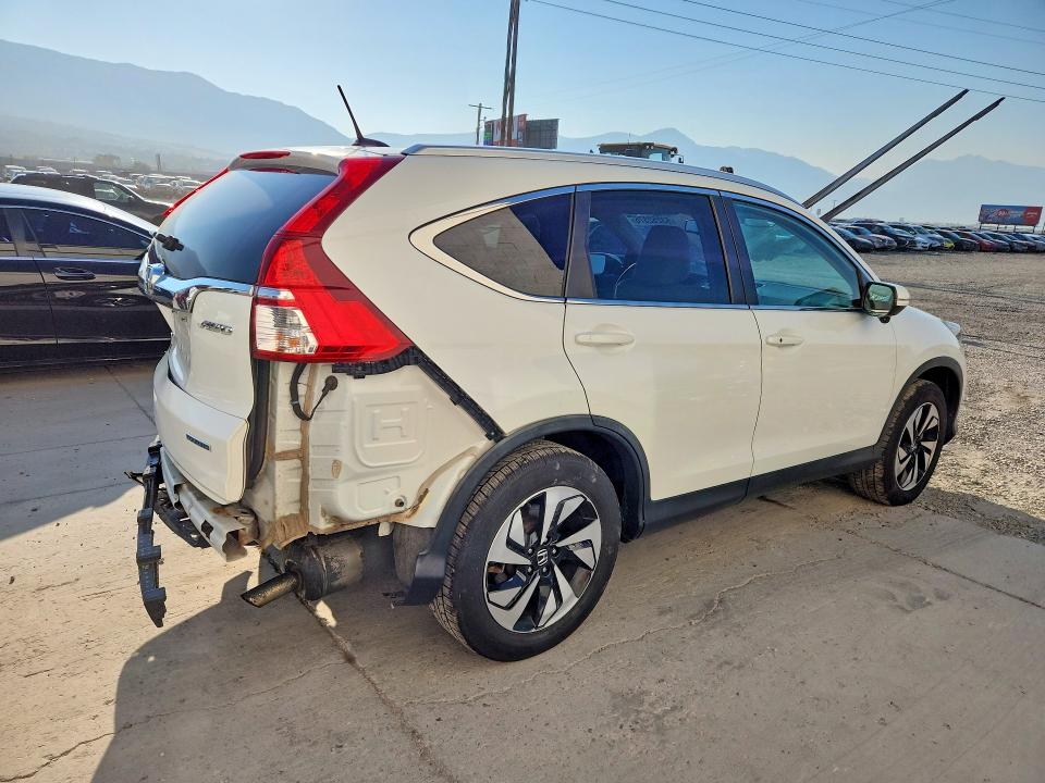 Photo 3 from auction – 2015 HONDA CR-V with VIN 5J6RM4H92FL096365
