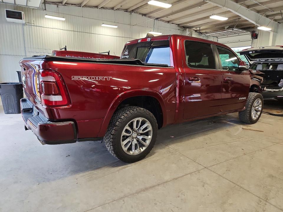 Photo 3 from auction – 2021 RAM 1500 with VIN 1C6SRFJT8MN524412