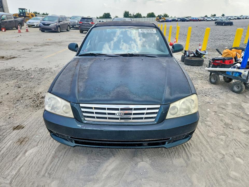 Photo 5 from auction – 2002 KIA OPTIMA with VIN KNAGD128125114426