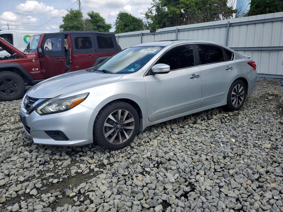 NISSAN ALTIMA 2017 with VIN 1N4AL3AP9HC227468 - Photo from auction