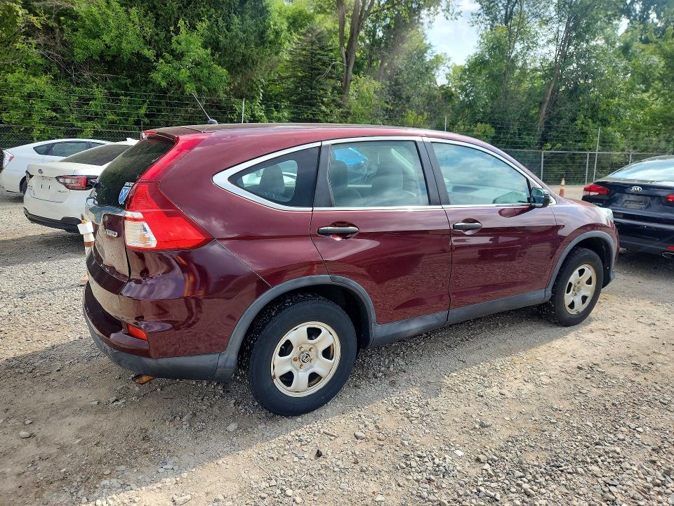 Photo 3 from auction – 2015 HONDA CR-V with VIN 2HKRM4H3XFH604443