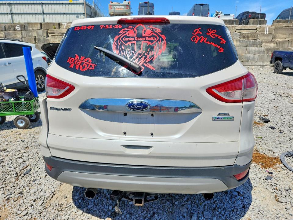Photo 6 from auction – 2013 FORD ESCAPE with VIN 1FMCU0H95DUB07379