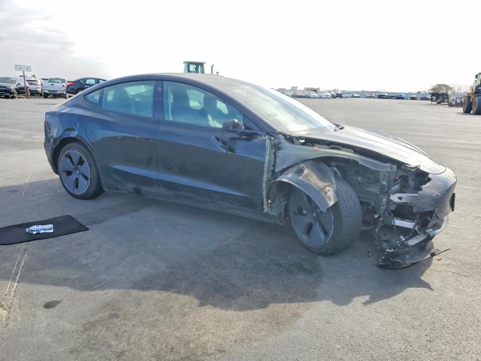 Photo 4 from auction – 2022 TESLA MODEL 3 with VIN 5YJ3E1EB4NF297488