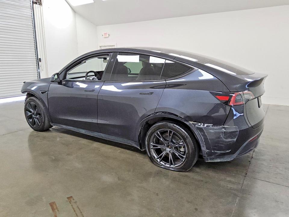Photo 2 from auction – 2025 TESLA MODEL  Y with VIN 7SAYGDED6SF237231