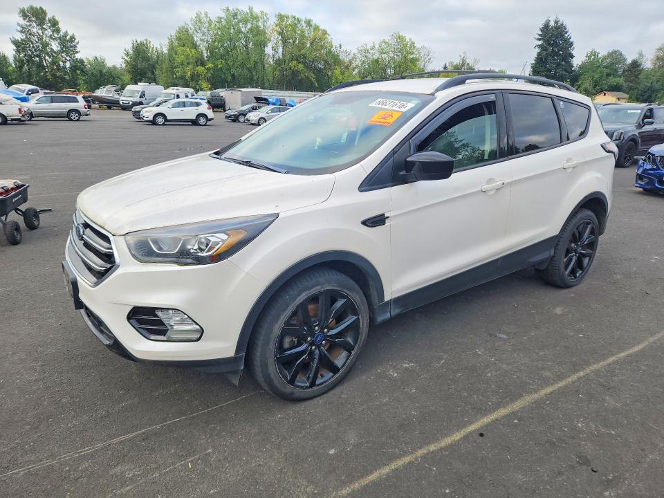 FORD ESCAPE 2018 with VIN 1FMCU9GD9JUC10021 - Photo from auction
