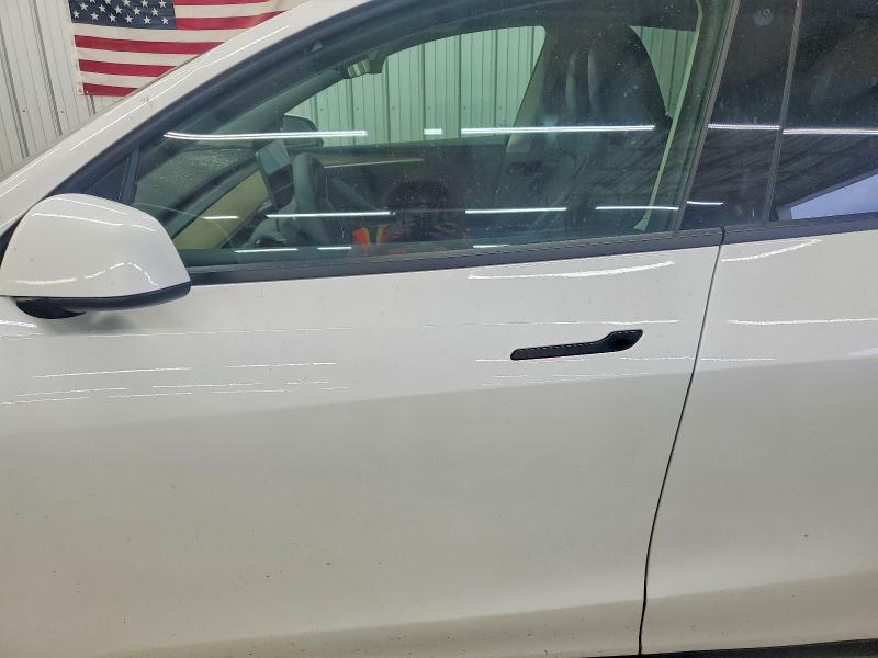 Photo 7 from auction – 2023 TESLA MODEL Y with VIN 7SAYGDEE7PF763657