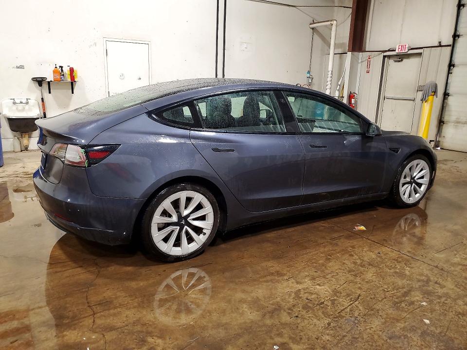 Photo 3 from auction – 2022 TESLA MODEL 3 with VIN 5YJ3E1EA4NF371239