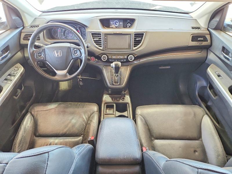 Photo 8 from auction – 2016 HONDA CR-V with VIN 2HKRM3H79GH559283