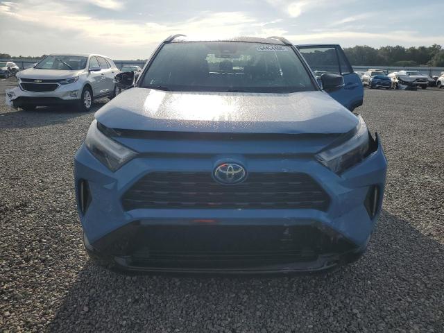 Photo 5 from auction – 2023 TOYOTA RAV4 with VIN 2T3E6RFV4PW041961