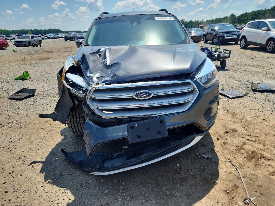 Photo 5 from auction – 2018 FORD ESCAPE with VIN 1FMCU9GD4JUC98394