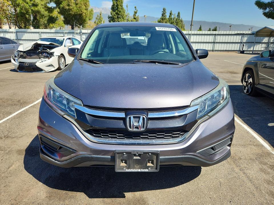 Photo 5 from auction – 2015 HONDA CR-V with VIN 2HKRM3H35FH504700