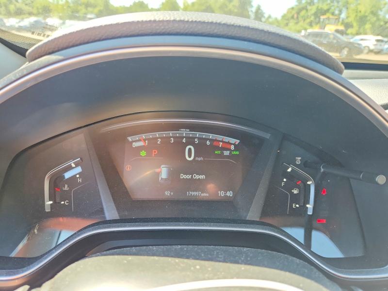 Photo 9 from auction – 2018 HONDA CR-V with VIN 7FARW2H84JE025986