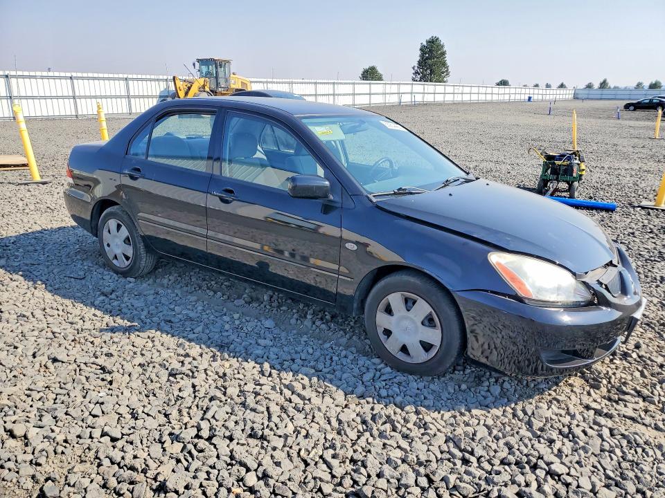 Photo 4 from auction – 2004 MITSUBISHI LANCER with VIN JA3AJ26E94U035584