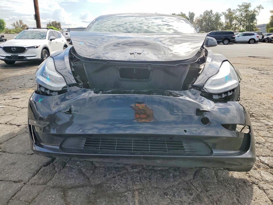 Photo 5 from auction – 2018 TESLA MODEL 3 with VIN 5YJ3E1EA2JF108371