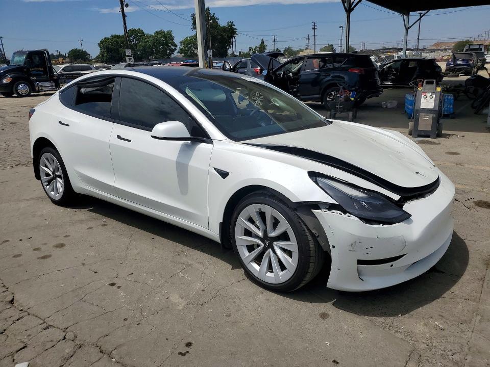 Photo 4 from auction – 2021 TESLA MODEL 3 with VIN 5YJ3E1EA7MF067823