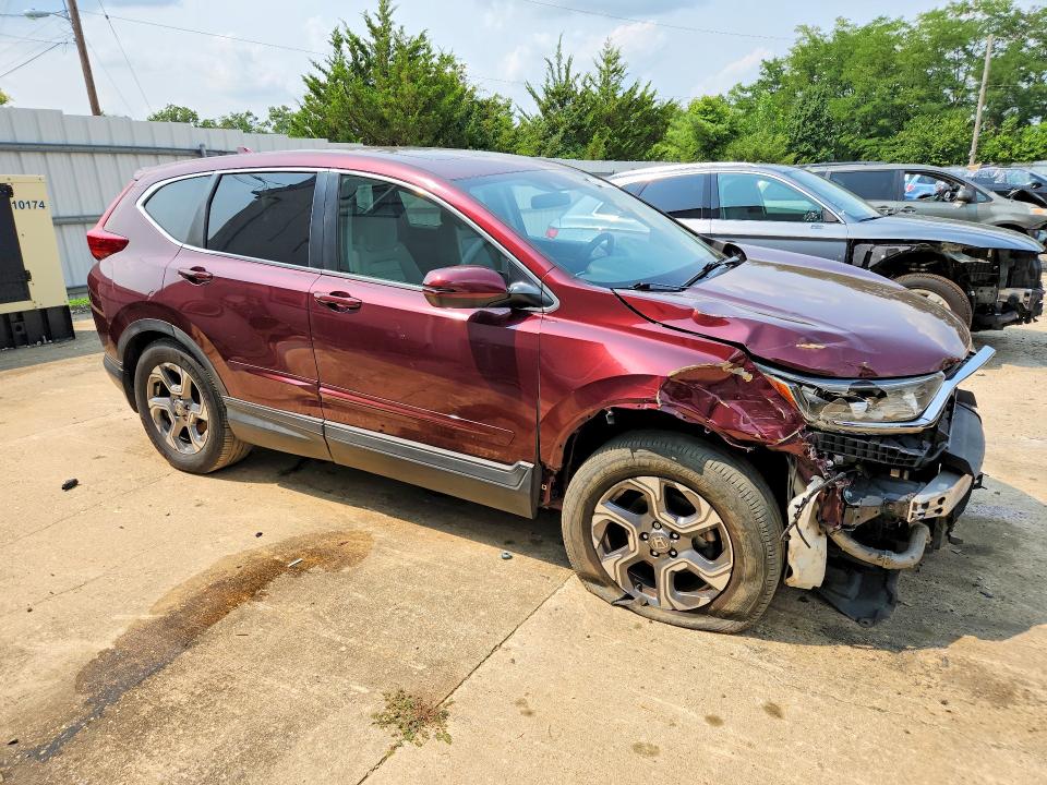 Photo 4 from auction – 2019 HONDA CR-V with VIN 2HKRW2H50KH620693