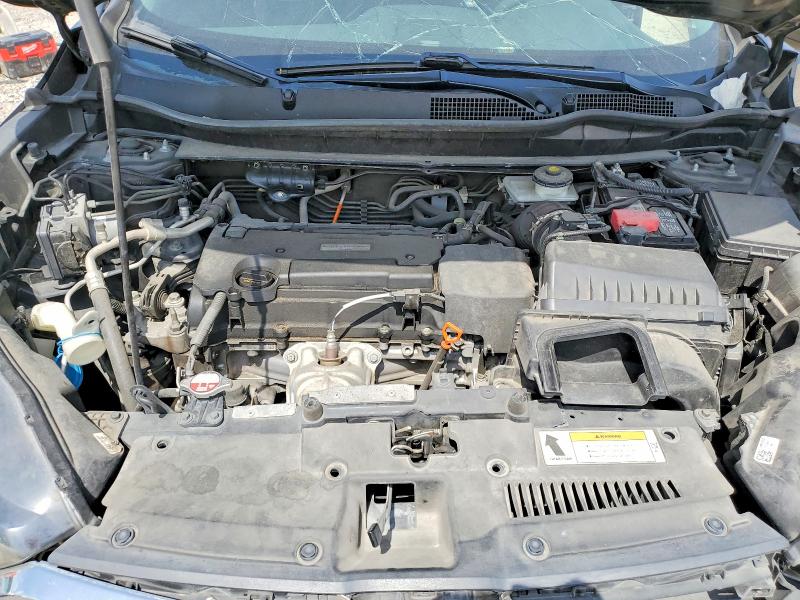Photo 11 from auction – 2018 HONDA CR-V with VIN 5J6RW5H33JL000716